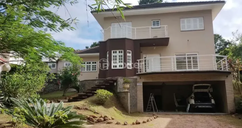 Casa em condomínio fechado com 4 quartos à venda na Rua dos Pica-Paus, 319, Tarumã, Viamão