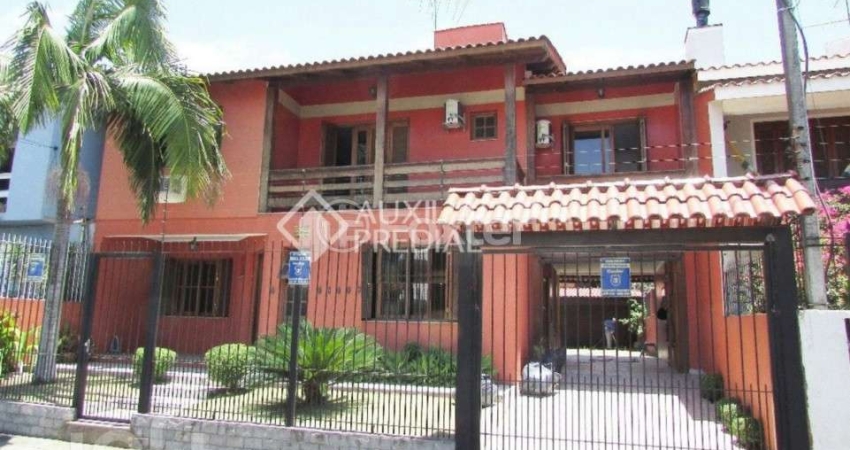 Casa com 4 quartos à venda na Rua Dom Jaime de Barros Câmara, 276, Sarandi, Porto Alegre