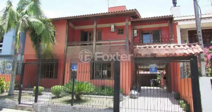 Casa com 4 quartos à venda na Rua Dom Jaime de Barros Câmara, 276, Sarandi, Porto Alegre