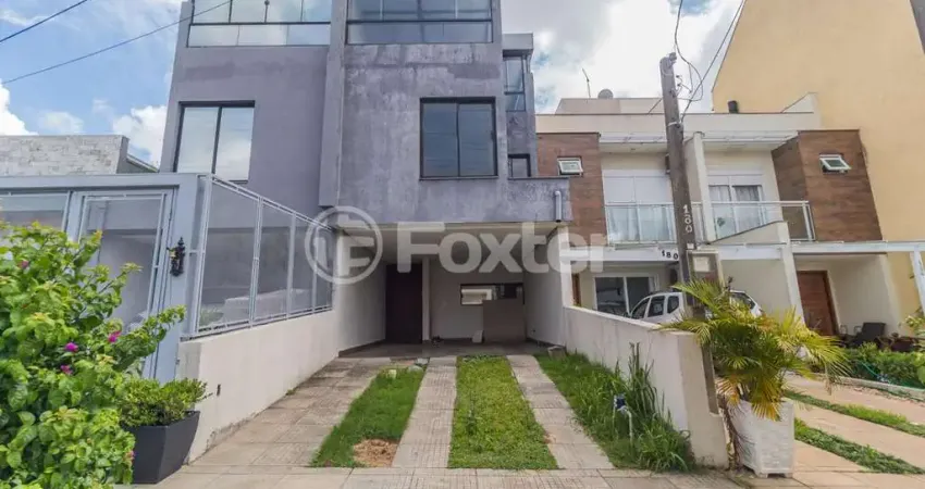 Casa em condomínio fechado com 3 quartos à venda na Rua Ângelo Raphael Frizzo, 172, Mário Quintana, Porto Alegre