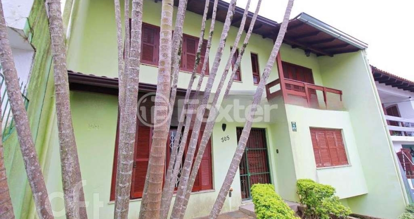 Casa com 3 quartos à venda na Rua Coronel Tisiano F. de Leoni, 305, Coronel Aparício Borges, Porto Alegre