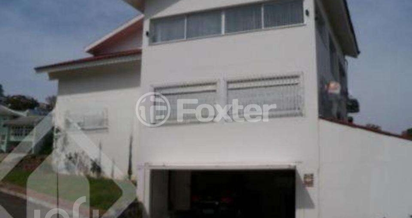 Casa em condomínio fechado com 3 quartos à venda na Rua Adriano Pereira da Silva, 450, Vila Nova, Porto Alegre