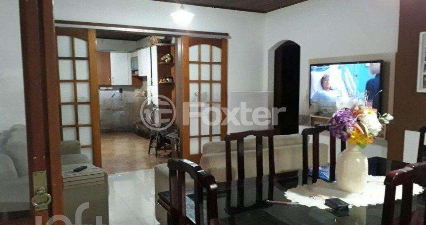 Casa com 4 quartos à venda na Rua Oscar Schmitt, 72, Arquipélago, Porto Alegre