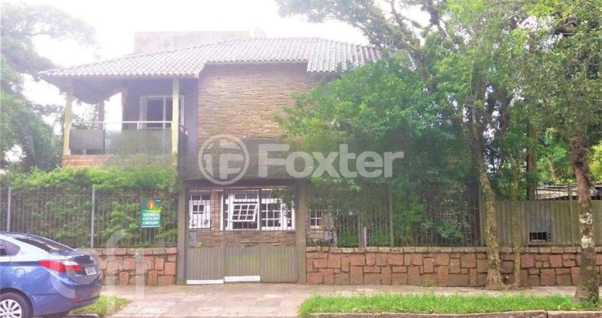 Casa com 3 quartos à venda na Avenida Beira Rio, 239, Belém Novo, Porto Alegre