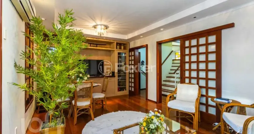 Casa com 3 quartos à venda na Rua Delfino Riet, 287, Santo Antônio, Porto Alegre