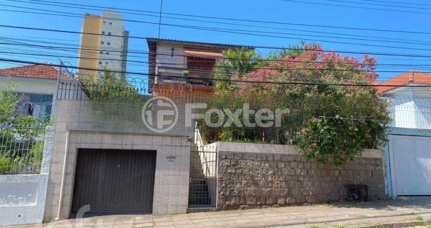 Casa com 5 quartos à venda na Rua Caldre e Fião, 54, Santo Antônio, Porto Alegre