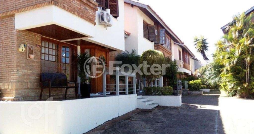 Casa em condomínio fechado com 3 quartos à venda na Avenida da Cavalhada, 6021, Cavalhada, Porto Alegre