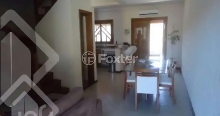 Casa em condomínio fechado com 2 quartos à venda na Avenida Edgar Pires de Castro, 1286, Hípica, Porto Alegre