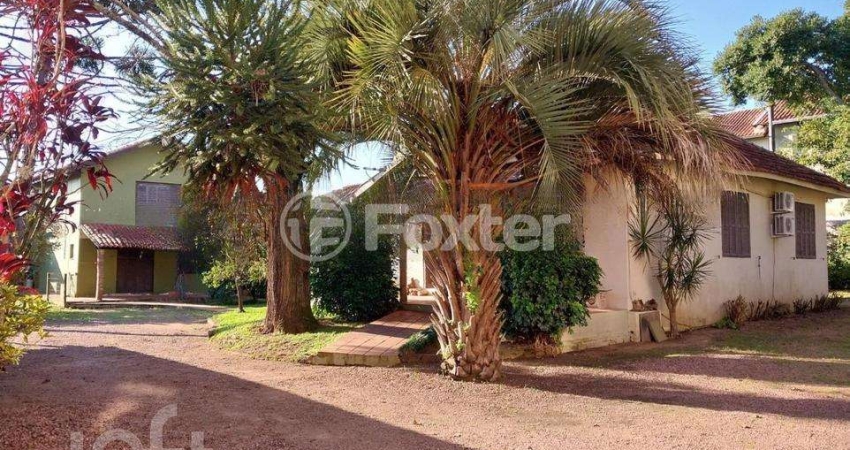 Casa com 3 quartos à venda na Travessa Escobar, 430, Camaquã, Porto Alegre