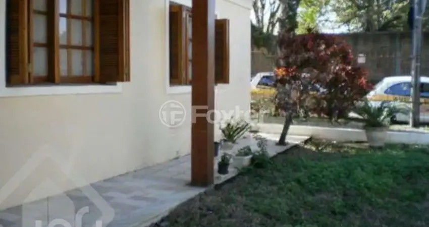 Casa com 5 quartos à venda na Rua Coelho da Costa, 215, Nonoai, Porto Alegre