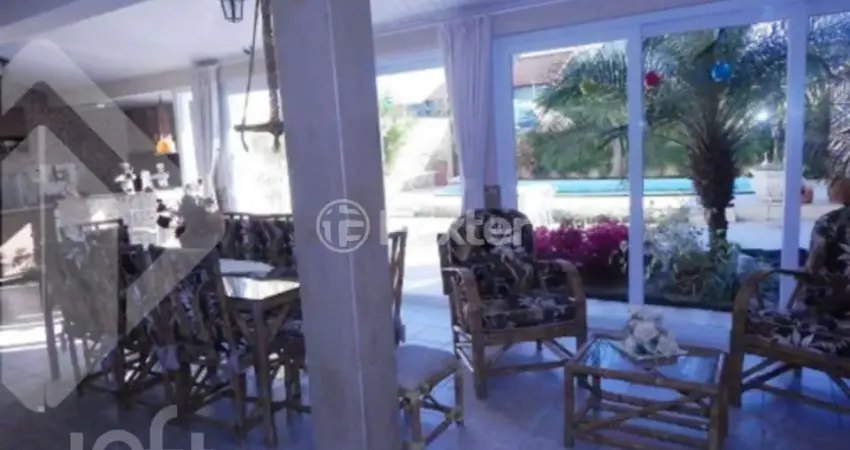 Casa em condomínio fechado com 4 quartos à venda na Rua Ancara, 381, Espírito Santo, Porto Alegre