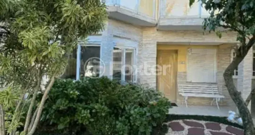 Casa em condomínio fechado com 4 quartos à venda na Rua Ancara, 381, Espírito Santo, Porto Alegre