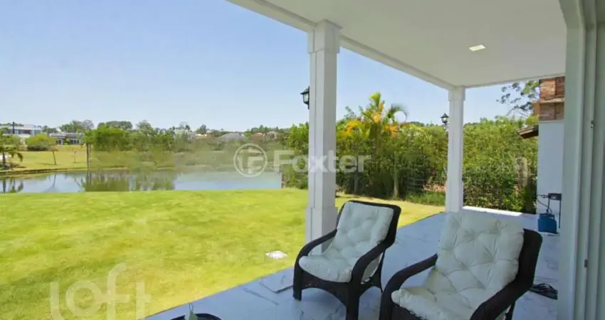 Casa em condomínio fechado com 5 quartos à venda na Avenida Juca Batista, 9000, Belém Novo, Porto Alegre