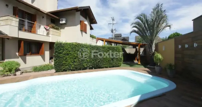 Casa com 4 quartos à venda na Rua das Petúnias, 301, Estância Velha, Canoas