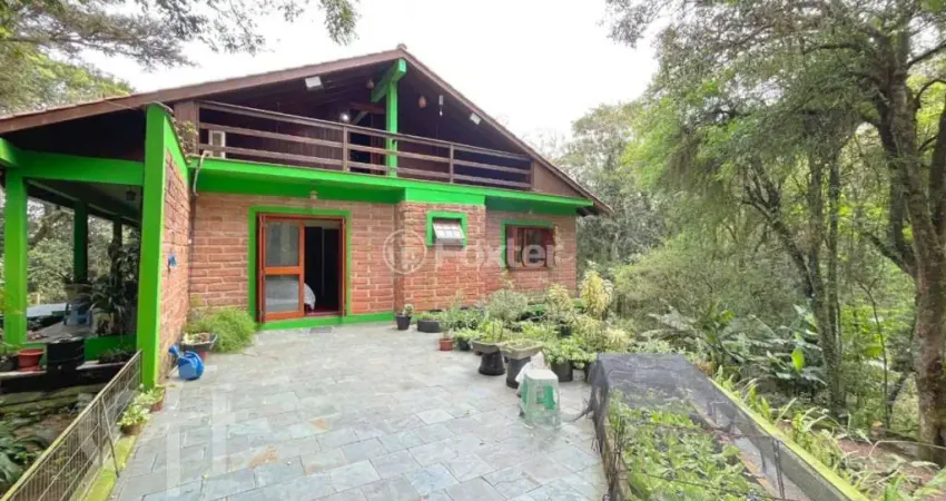 Casa com 6 quartos à venda na Rua Monteverde, 128, Cascata, Porto Alegre