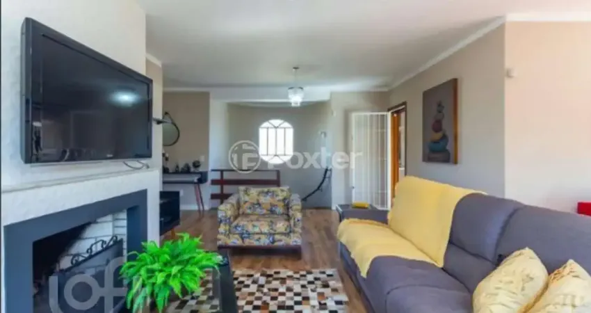 Casa com 4 quartos à venda na Rua Criciúma, 115, Guarujá, Porto Alegre