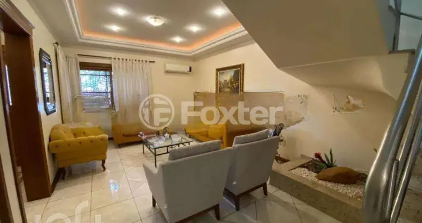 Casa com 4 quartos à venda na Rua das Bromélias, 240, Estância Velha, Canoas