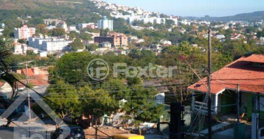 Casa com 3 quartos à venda na Rua Erechim, 70, Nonoai, Porto Alegre