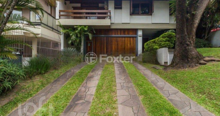 Casa com 4 quartos à venda na Rua Carlos Trein Filho, 1255, Auxiliadora, Porto Alegre