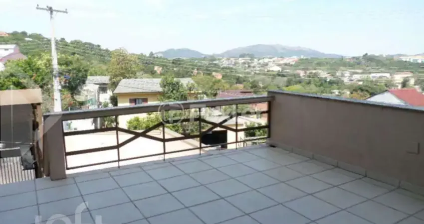 Casa com 3 quartos à venda na Rua Ângelo Passuelo, 220, Vila Nova, Porto Alegre