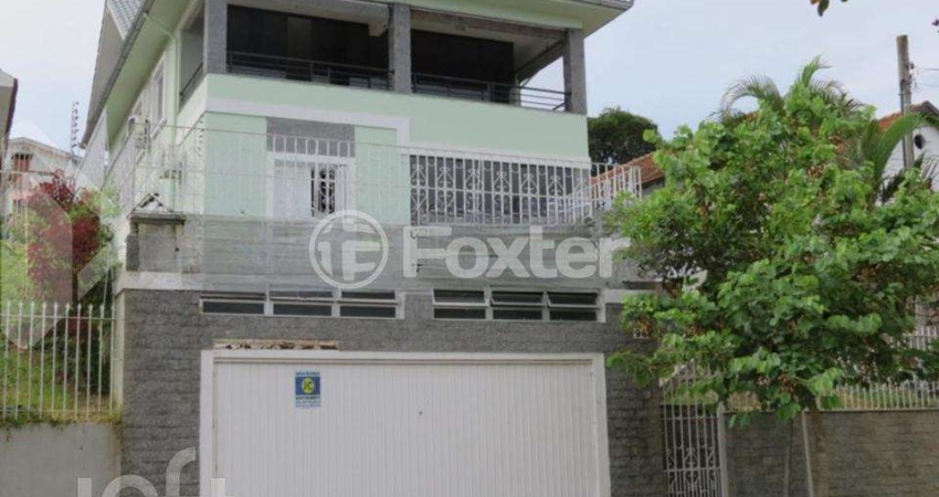 Casa com 5 quartos à venda na Rua Oscar Tollens, 98, Santa Tereza, Porto Alegre