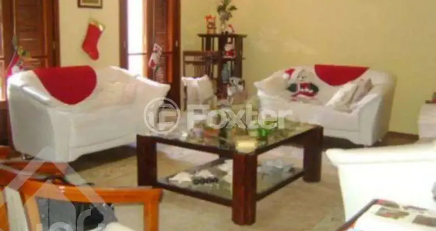 Casa com 4 quartos à venda na Rua Gustavo Schmidt, 297, Três Figueiras, Porto Alegre