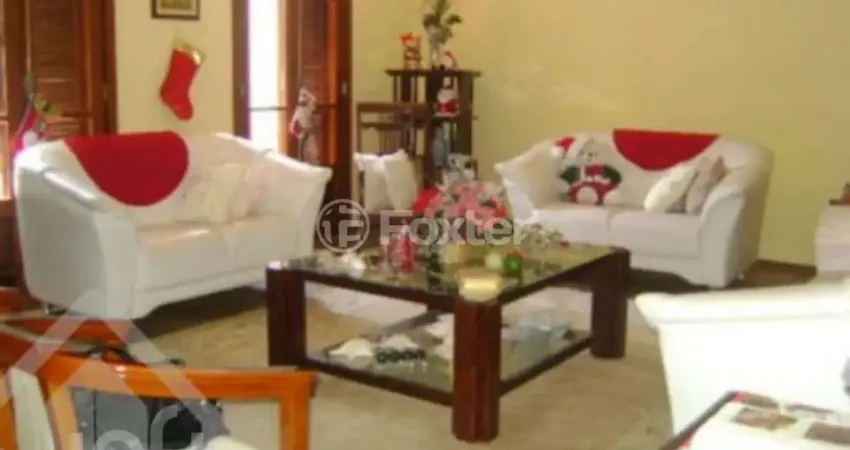 Casa com 4 quartos à venda na Rua Gustavo Schmidt, 297, Três Figueiras, Porto Alegre