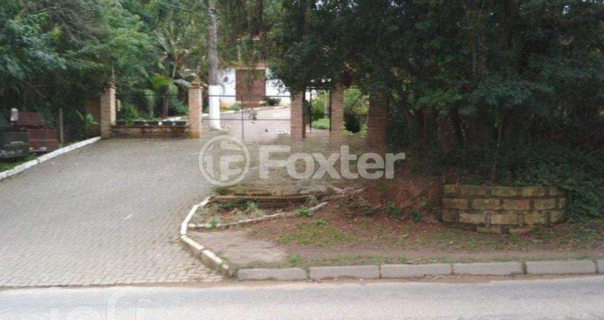 Casa com 3 quartos à venda na Estrada João Passuelo, 1100, Vila Nova, Porto Alegre