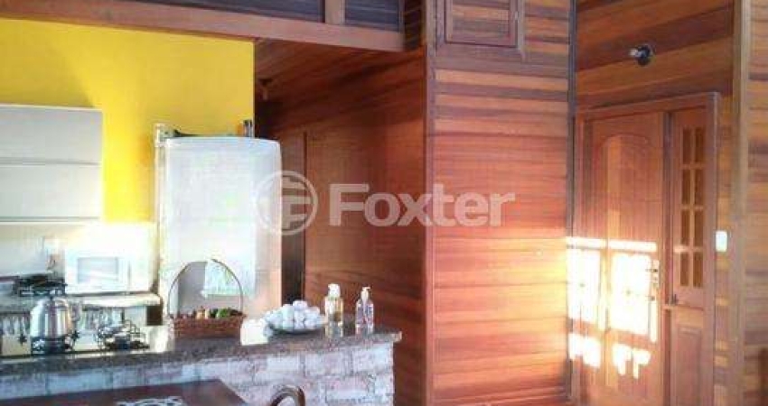 Casa com 3 quartos à venda na Rua Maurílio Ferreira, 370, Campo Novo, Porto Alegre