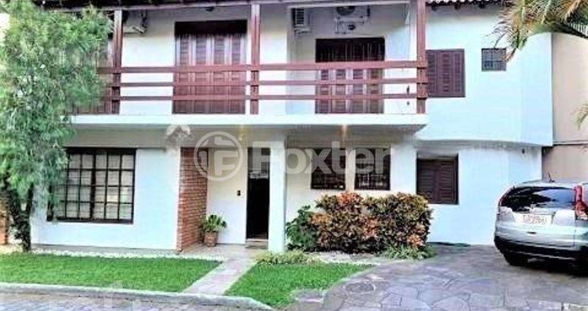 Casa em condomínio fechado com 3 quartos à venda na Rua Conrado Ferrari, 71, Jardim Isabel, Porto Alegre