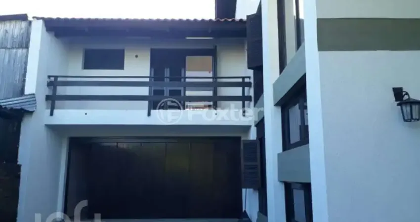 Casa com 4 quartos à venda na Avenida da Cavalhada, 3410, Cavalhada, Porto Alegre