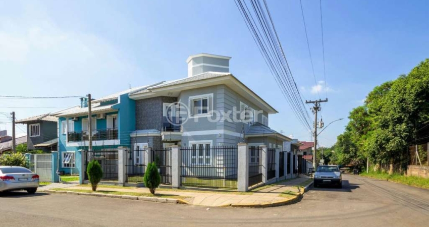 Casa com 3 quartos à venda na Rua Eloi Joalmes Teixeira, 11, Parque da Matriz, Cachoeirinha