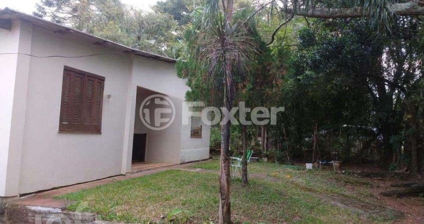 Casa com 3 quartos à venda na Estrada Kanazawa, 50, Vila Nova, Porto Alegre