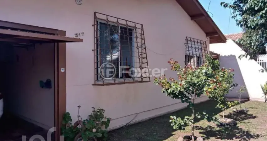 Casa com 3 quartos à venda na Rua Osvaldo Optiz, 317, Estância Velha, Canoas
