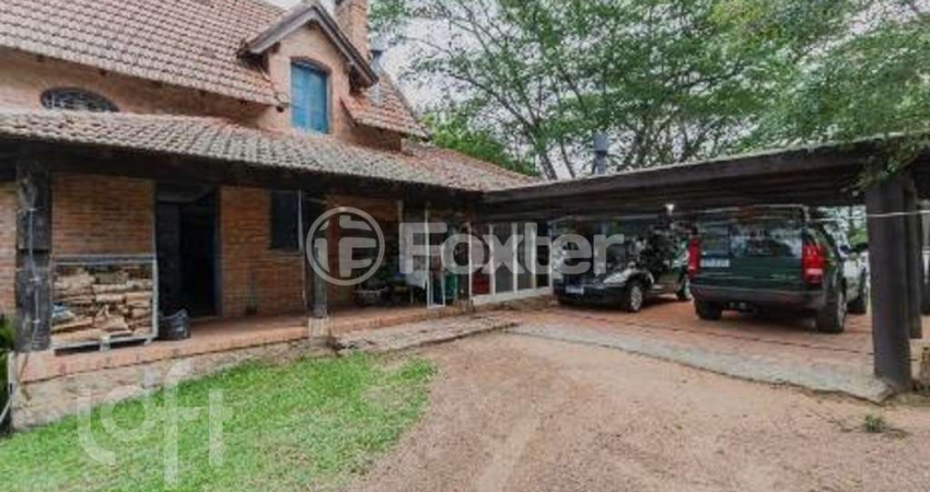 Casa com 3 quartos à venda na Rua dos Pescadores, 1700, Arquipélago, Porto Alegre