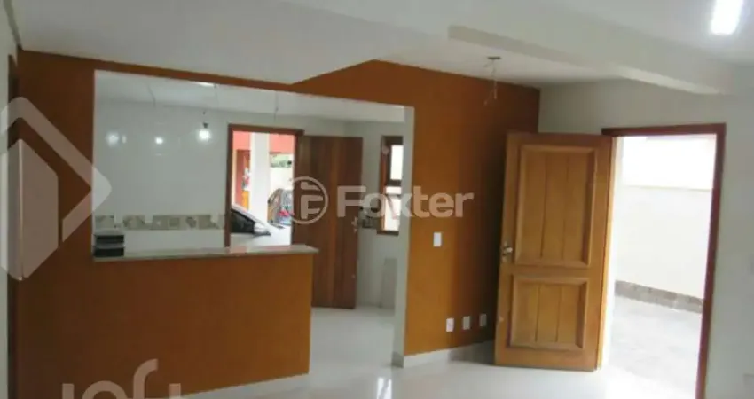 Casa em condomínio fechado com 3 quartos à venda na Rua Padre João Batista Reus, 2522, Camaquã, Porto Alegre
