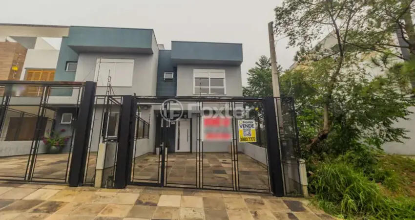 Casa com 3 quartos à venda na Rua Manoel Fernandes, 90, Guarujá, Porto Alegre