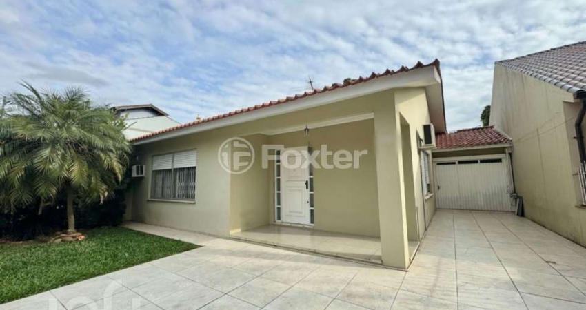 Casa com 4 quartos à venda na Rua dos Girassóis, 215, Igara, Canoas