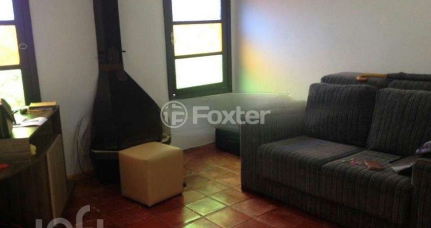 Casa com 4 quartos à venda na Avenida Guarujá, 136, Guarujá, Porto Alegre