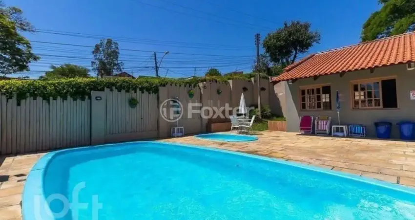 Casa em condomínio fechado com 3 quartos à venda na Rua Humberto de Campos, 601, Partenon, Porto Alegre