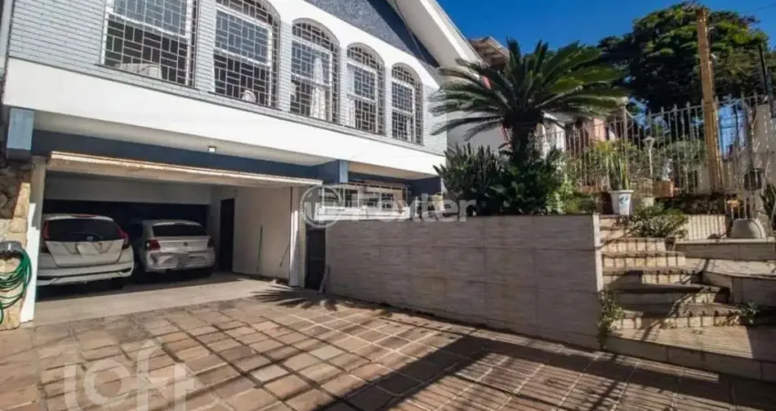 Casa com 3 quartos à venda na Rua Paulino Chaves, 427, Santo Antônio, Porto Alegre