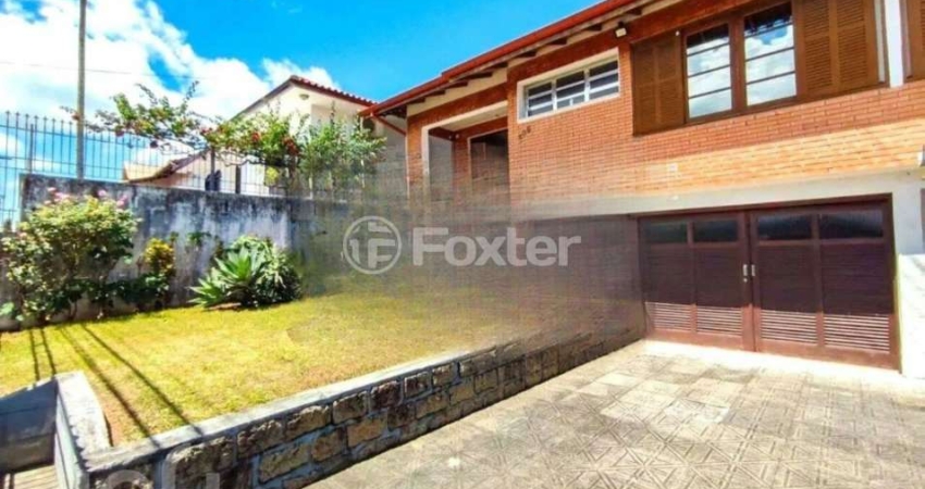 Casa com 3 quartos à venda na Rua Pascoal Simone, 305, Coqueiros, Florianópolis