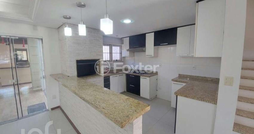 Casa com 4 quartos à venda na Rua Alexandre de Gusmão, 390, Hípica, Porto Alegre