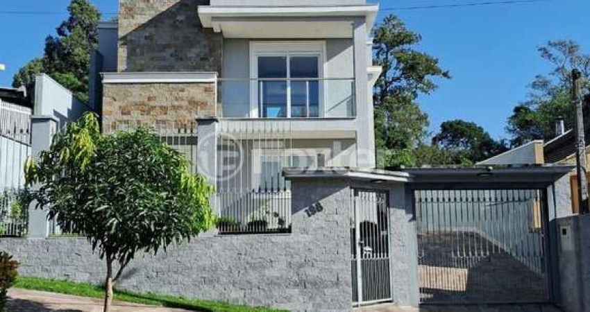 Casa com 3 quartos à venda na Rua Jacarandá, 198, São José, Sapucaia do Sul