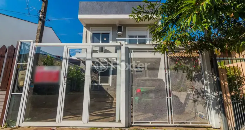 Casa com 3 quartos à venda na Rua Felipe Arísio, 121, Hípica, Porto Alegre