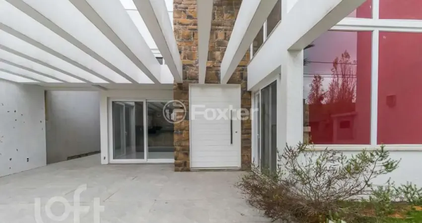 Casa em condomínio fechado com 5 quartos à venda na Avenida Juca Batista, 8000, Belém Novo, Porto Alegre