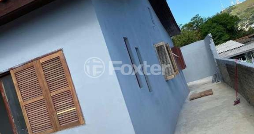 Casa com 4 quartos à venda na Rua Paulino Azurenha, 966, Partenon, Porto Alegre