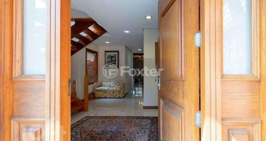 Casa em condomínio fechado com 3 quartos à venda na Avenida Juca Batista, 8000, Belém Novo, Porto Alegre