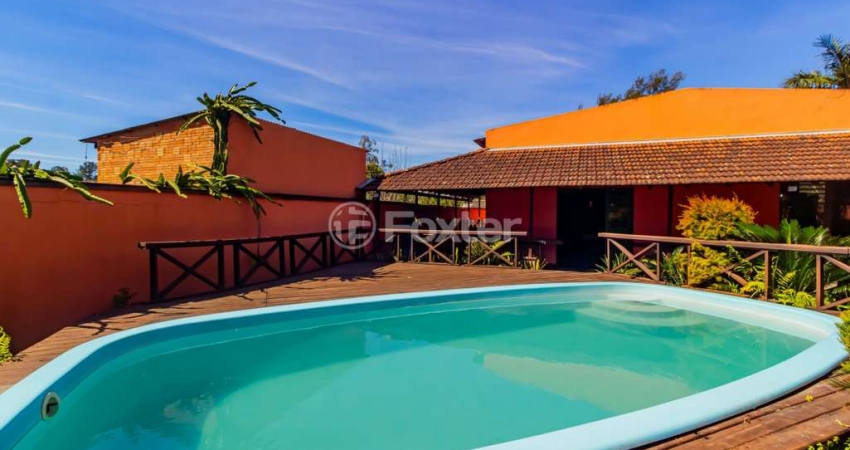 Casa com 3 quartos à venda na Rua Santa Mônica, 375, Ponta Grossa, Porto Alegre