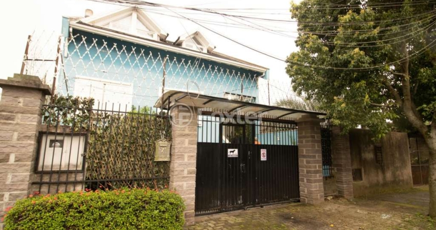 Casa com 3 quartos à venda na Rua Itapema, 156, Vila Jardim, Porto Alegre